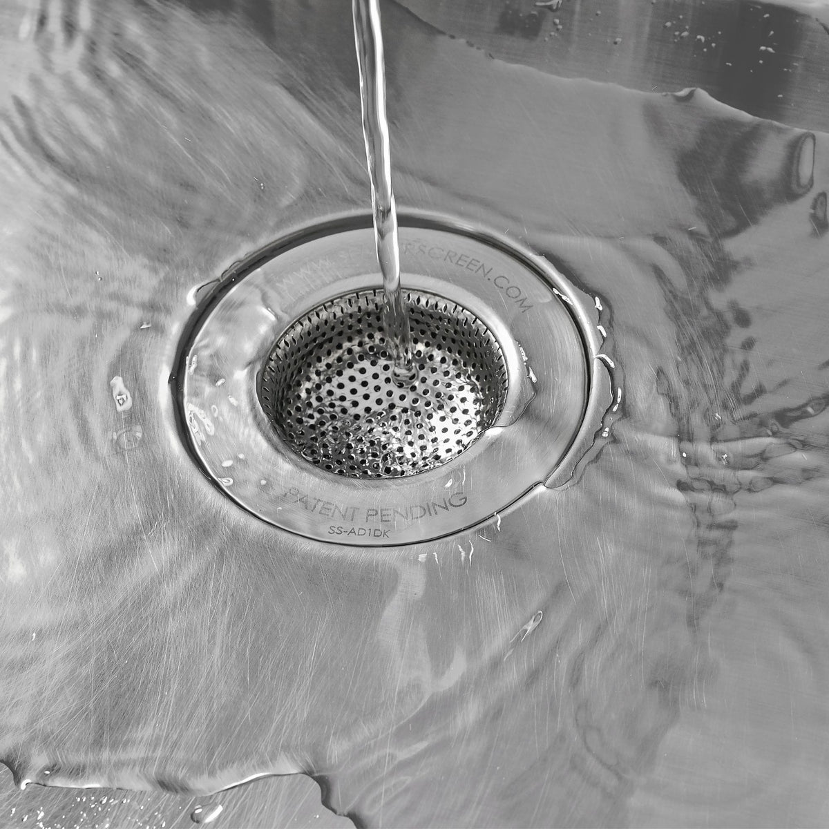 Kitchen sink drain with a SemperScreen® permanent sink screen installed